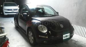 Volkswagen New Beetle ()