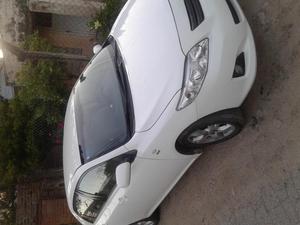 toyota corolla impecable