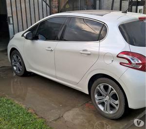 VENDO IMPECABLE PEUGEOT 208 EN GARANTIA