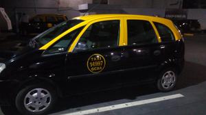 taxi meriva  unico dueño 290 mil con licencia