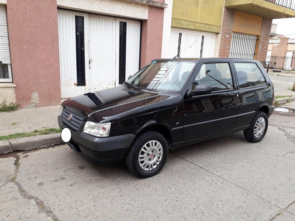 FIAT UNO Mod. , AIRE Y DIRECCION, TITULAR $ 