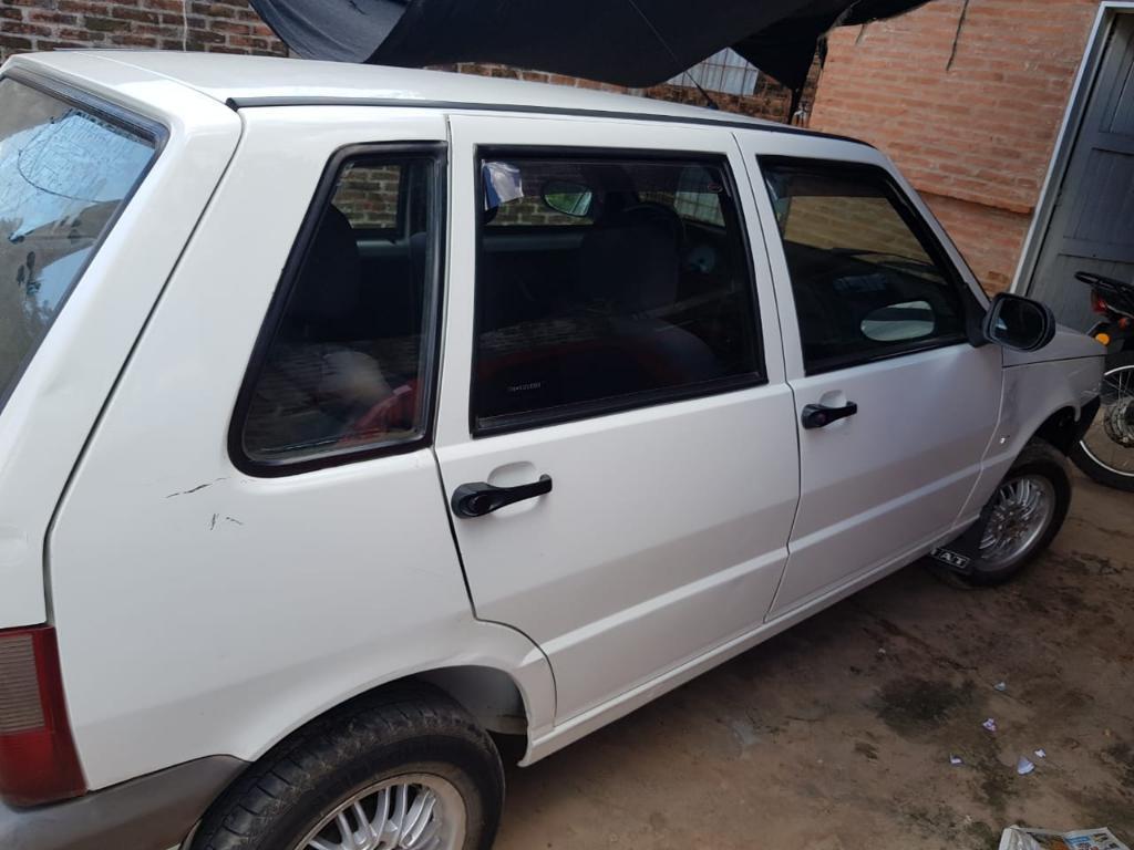 Fiat Uno  con Aire $120