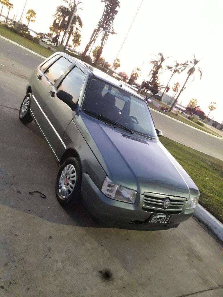 Vendo Fiat Uno. Recibo Moto