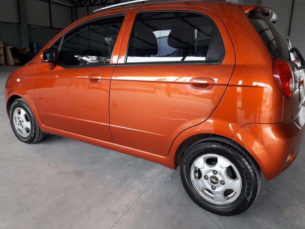 HERMOSO SPARK NARANJA  LT FULL RECIBO MENOR FINANCIO